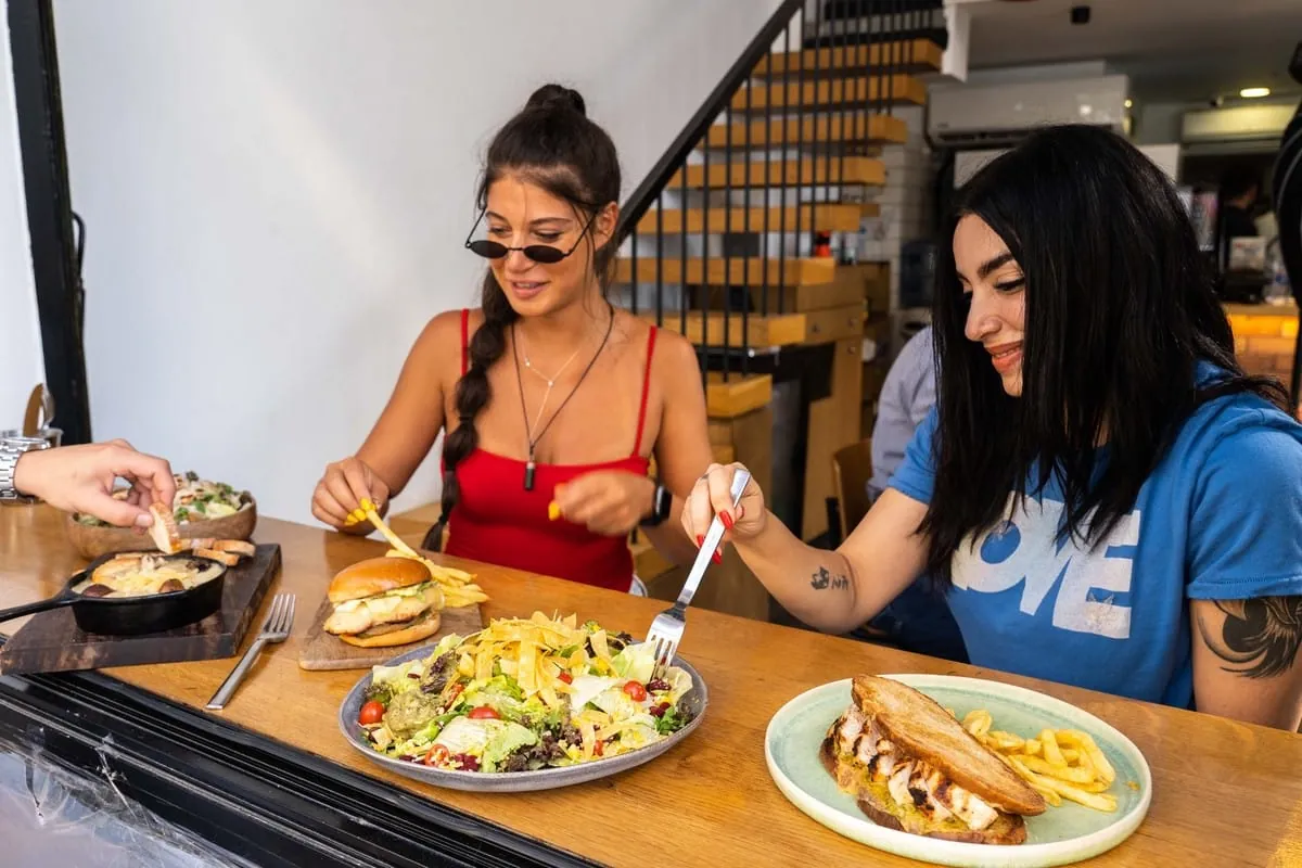 Guests eating at the Husk counter
